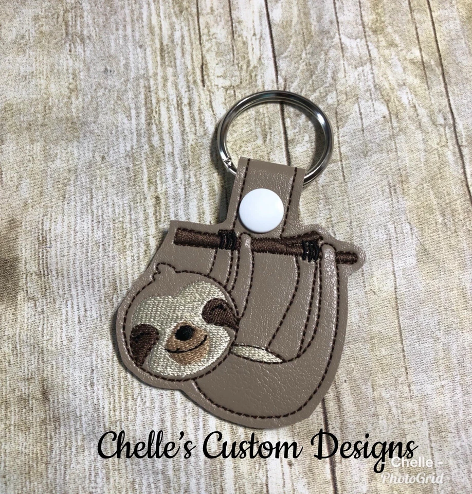 Llavero de vinilo sintético perezoso hace un GRAN regalo Foto 1 de 1