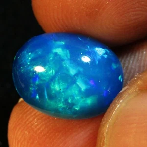 4.24Cts Natural Color Play Ethiopian Blue Opal Oval Cabochon Loose Gem VOD - Picture 1 of 3