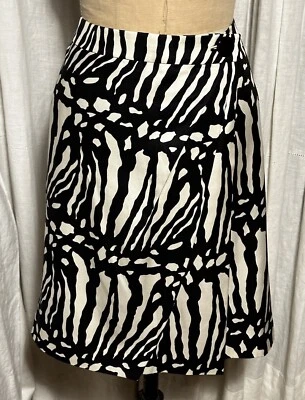 Falda envolvente sintética Ann Taylor para mujer negra/blanca mezcla de lana seda rodilla L talla 8 usada Foto 1 de 4