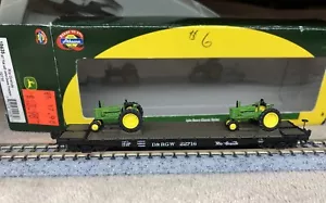 N Scale New ATHEARN 10435 53' Rio Grande FLAT CAR w/ 2ea JOHN DEERE TRACTORS - Picture 1 of 11