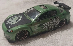 Jada Toys Import Racer #018 Mazda RX-8 Green/Black Tokico Gas Shocks 1:64 - Picture 1 of 6