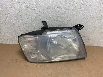 2003 至 2006 年三菱 Montero 右右手侧卤素车头灯 M3847 DW — 第 1/4 张图片