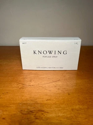 Cartera spray vintage Estee Lauder Knowing recargable tono dorado - 7,5 ml / 0,25 oz  Foto 1 de 4
