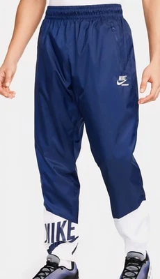 $105... Pantalones Nike Windrunner talla XL forrados tejidos azul marino/blanco.  Hj2034 492. Foto 1 de 4
