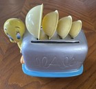 Warner Bros. Looney Tunes Tweety Bird toaster-shaped measuring spoon holder set