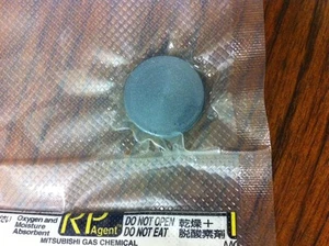Objetivo pulverizador de lantano (99,9% La/TREM), 1,00" dia x 0,125"" de espesor, en aceite - Imagen 1 de 2