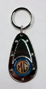 Llavero opticá carbonífero MG 100 x 40 mm - Imagen 1 de 1