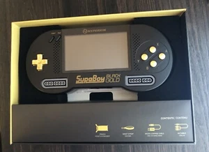 Sistema portátil Hyperkin SupaBoy negro dorado SNES SFC Super Famicom Nintendo - Imagen 1 de 3