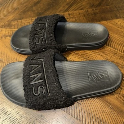 Sandalias deslizables Vans de cuero sintético peludo negras para mujer talla 9 Foto 1 de 4