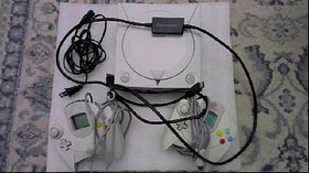 Working Sega Dreamcast, two controllers, two memory cards, and hyperkin hd