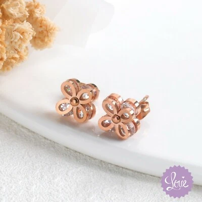 Aretes con flores circonita cúbica para mujer joyería acero quirúrgico enchapado en oro rosa Foto 1 de 4