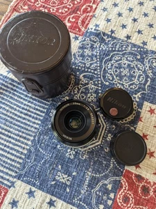 Nikon Ai NIKKOR 35mm f/2.8 Wide Angle Lens F Mount w/ caps and case - Picture 1 of 3