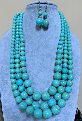 Juego de aretes collar gradual con cuentas de lucita turquesa aspecto agrietado de tres capas Foto 1 de 3