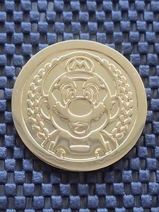 New Super Mario Bros 2 3DS Coin Medal UK Preorder Bonus Rare Promo NES Nintendo. - Bild 1 von 13