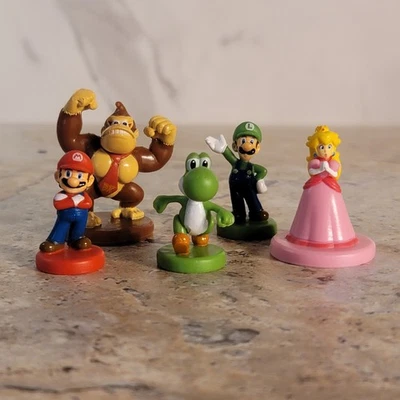 Fichas de substituição MONOPOLY GAMER & POWER PACK: MARIO, PEACH, YOSHI, DK & LUIGI - Imagem 1 de 4