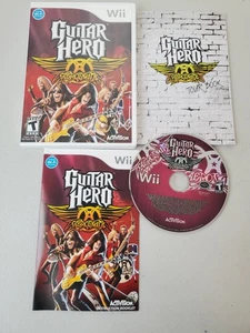 Guitar Hero: Aerosmith (Nintendo Wii, 2008) COMPLETE disk/case/manual Tour Book - Picture 1 of 1