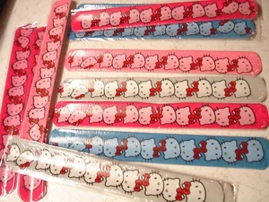12 SLAP BRACELETS ( HELLO KITTY ) LOT OF 12 CARNIVAL PARTY TOYS FAVORS - Picture 1 of 5