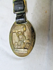 NEW LISTING - Vintage Watch Fob - Euclid Pivot Steer Loaders (399 - Picture 1 of 8