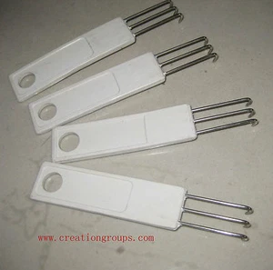 Nuovo set di 4 appendiabiti per macchina per maglieria Brother argento reed cantante - Foto 1 di 2