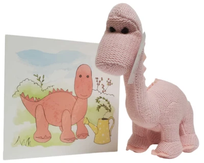 Sonajero y tarjeta bebé dinosaurio Diplodocus rosa de algodón orgánico tejido Foto 1 de 4