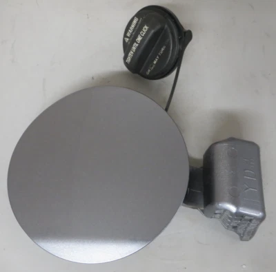 2017-2018 Kia Forte - Fuel Door (silver) - Image 1 of 3