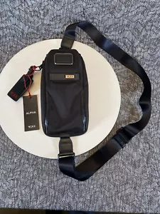 Bandolera Tumi Compact Sling 142398-1041 negra - Imagen 1 de 11