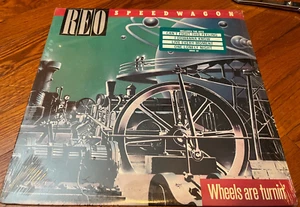 REO SPEEDWAGON Wheels Are Turnin' ORIGINAL 1984 LP in Shrink + Hype Sticker NM - Imagen 1 de 1