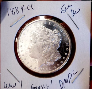 DÓLAR DE PLATA MORGAN 1884 CC GEMA BU DMPL CAMAFEO BLANCO Y NEGRO EX GSA WOW - Imagen 1 de 10