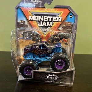 Camion Spin Master Monster Jam Steel Reveal Son-UVA Digger Series 32 1:64 - Foto 1 di 2
