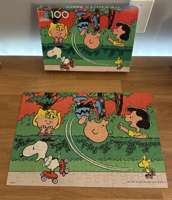 VTG MB Peanuts 100‑Piece Puzzle Snoopy Charlie Brown & Lucy Skating COMPLETE - Image 1 of 4