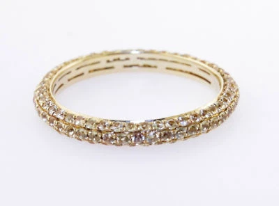 Nueva banda de eternidad de oro amarillo de 18 quilates y zafiro amarillo de 1,13 quilates Foto 1 de 4