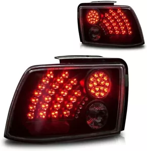 Luces traseras LED WINJET ALTURA - lentes negras/ahumadas - se adaptan a Ford Mustang 1999-2004 - Imagen 1 de 5