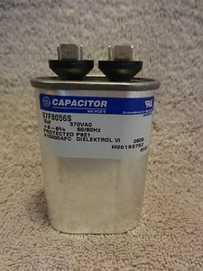 NEW GE 97F8056S OVAL RUN CAPACITOR 370VAC 5 MFD - Picture 1 of 3