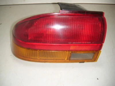 1991-1992 Saturn SL 1 2 S series 4 door sedan Left Driver Oem tail light  - Image 1 of 4