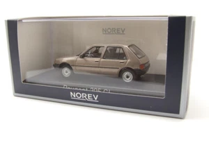 NOREV 1:43 AUTO DIE CAST METAL  PEUGEOT 205 GL  1988  MARRONE CHIARO ART 471724 - Foto 1 di 6