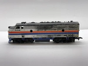 HO Scale #106 Amtrak Powered Diesel Locomotive Unbranded Needs Wheels - Picture 1 of 12