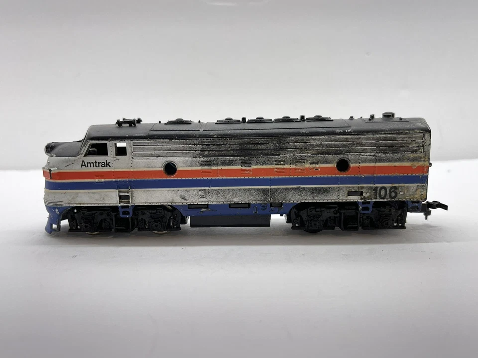 HO Scale #106 Amtrak Powered Diesel Locomotive Unbranded Needs Wheels - Image 1 of 4