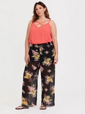 Черные шифоновые брюки Torrid с цветочным рисунком полупрозрачные размер 1 - Изображение 1 из 4