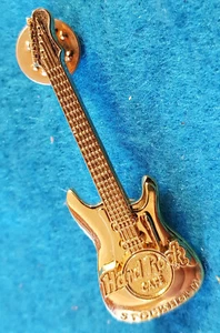 GUITARRA STRATOCASTER FENDER TONO DORADO PULIDO 3D ESTOCOLMO 04 PIN Hard Rock Café - Imagen 1 de 1