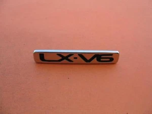 1998 1999 MAZDA 626 LX V6 REAR TRUNK LID CHROME EMBLEM LOGO BADGE SIGN SYMBOL - Picture 1 of 3