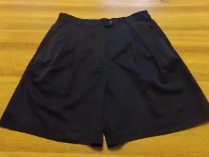 12 Pantalones cortos de golf plisados azul marino marca Izod para mujer - Imagen 1 de 6