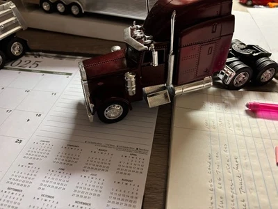 1/32 NEW RAY  NEW  BURGUNDY PETERBILT 379  SEMI TRACTOR, NO PACKAGING #B 590 - Image 1 of 4