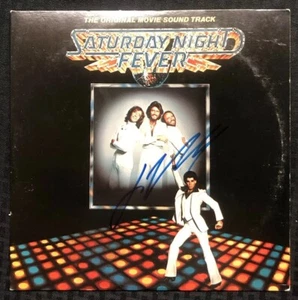 JOHN TRAVOLTA Saturday Night Fever album autografato firmato - PSA DNA Killer!!!! - Foto 1 di 4