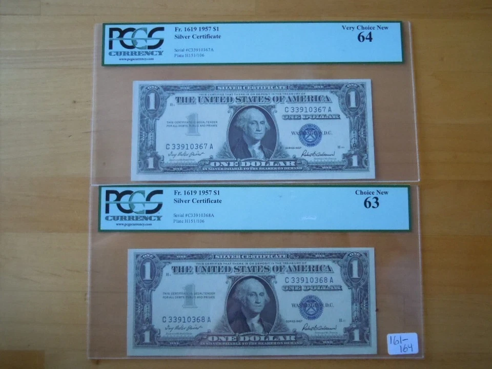 (2) 1957 $1 Consecutive Blue Seal Silver Certificates PGCS Graded 63 & 64 - Image 1 of 4