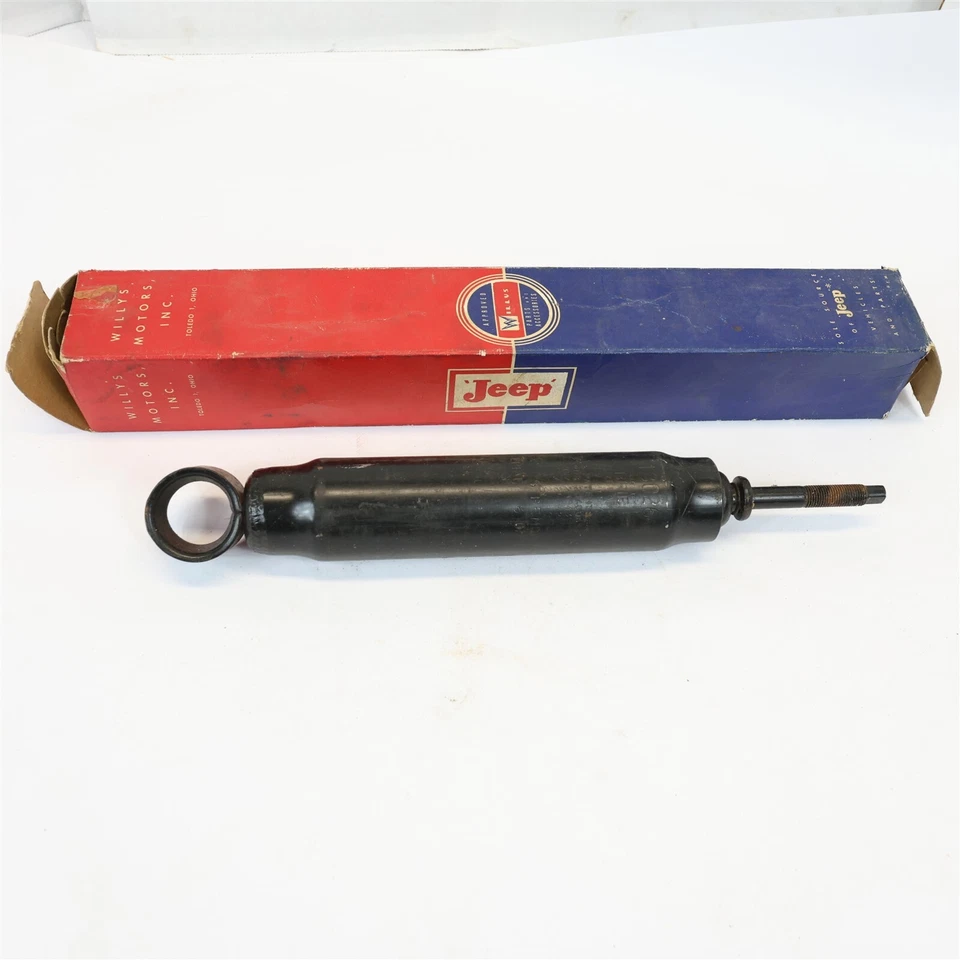Amortiguador delantero Willys de la década de 1950 como nuevo en caja original parte Willys # 806499 vintage nuevo Foto 1 de 4