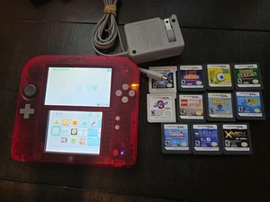 Nintendo 2DS Crystal Red 64gb versione USA con 11 giochi - Foto 1 di 1