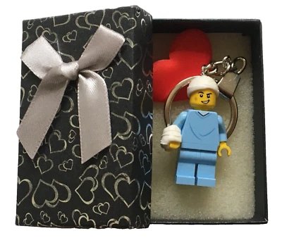 Lego Child in hospital pajamas w/  a cast on his arm/ head Keychain - C58 - Image 1 of 4