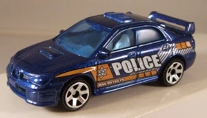 MATCHBOX #93 2007 Subaru Impreza WRX Police, 2014 issue (LOOSE / MINT) - Picture 1 of 2