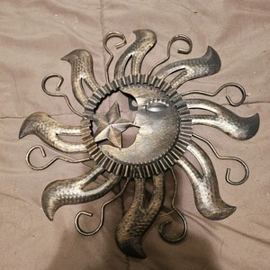 metal wall art decoration featuring a celestial design of a sun, moon, and... - Picture 1 of 2