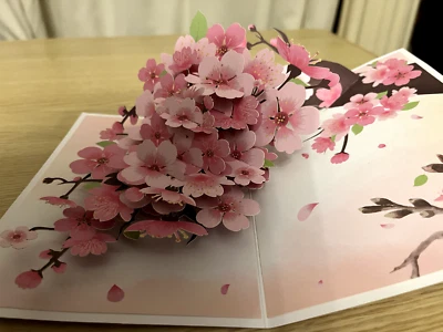 Preciosa tarjeta emergente 3D de flor de cerezo Foto 1 de 2
